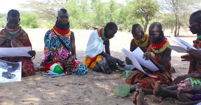 Figure 4. Group photograph-elicitation session held with women at Kangarisae market, south Turkana, September 2014.